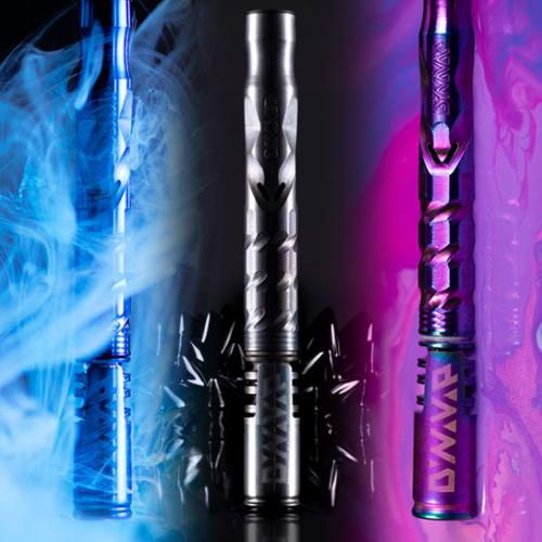 Three colored DynaVap vaporizer pens photographed against smoke and paint backgrounds