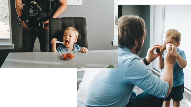 Behind-the-scenes video shoot of a camera operator filming a toddler eating and playing