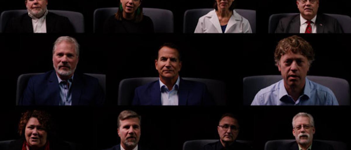 Grid of twelve video interview headshots against a dark background