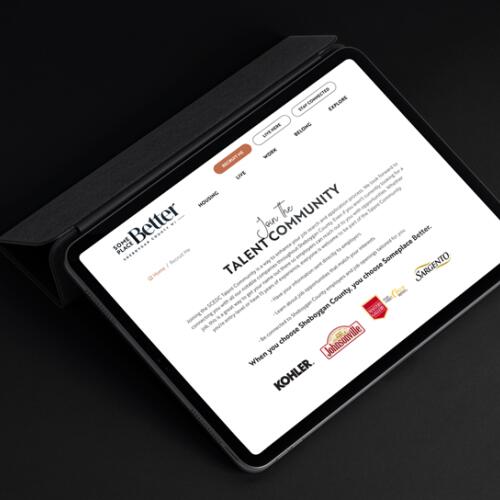 Tablet mockup of the Someplace Better talent community website