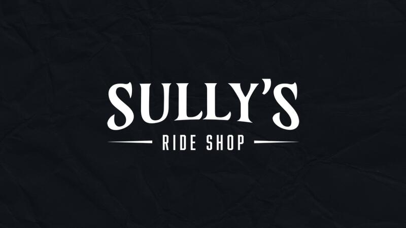 Sully's Ride Shop logo on a black textured background
